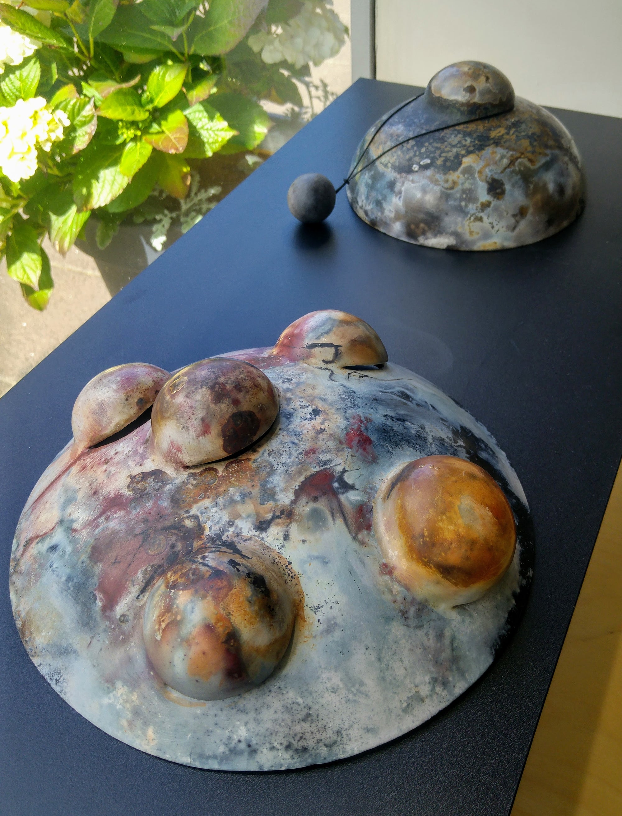 Pit-fired wall sculptures