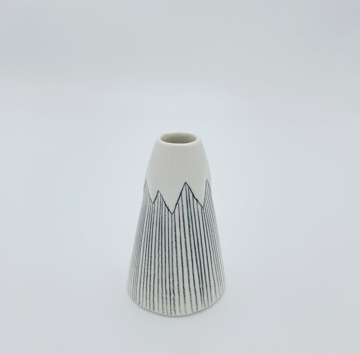Volcano vase with lines and blue in the inside