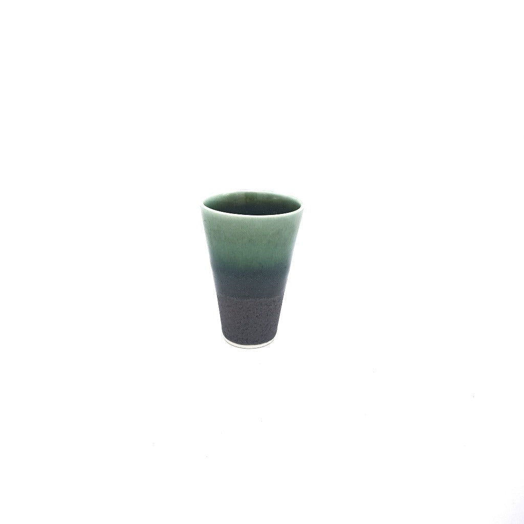 Kaolin -Iceramic. Espresso cup with Mossy glaze.