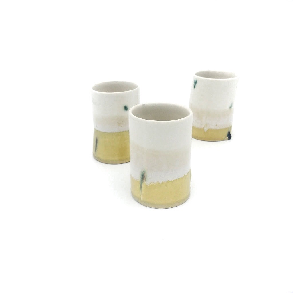 Kaolin-gudnyhaf Porcelain coffiecup/glass-color white and yellow.