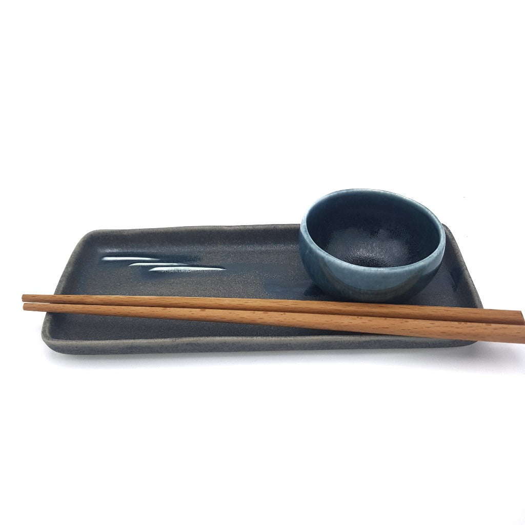 Kaolin - iceramic - Black beach / sushi set. A set of a long plate and a small bowl in the color of blue/gray. Color in the glaze called "Black beach"
